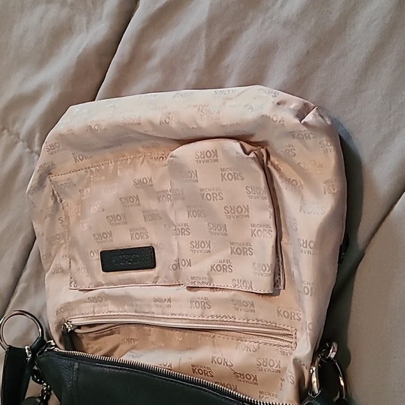 Michael Kors blue bag.